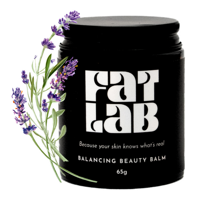 Black jar of Fat Lab balancing beauty balm with lavender sprig on a white background